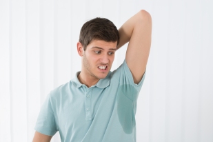 Man With Hyperhidrosis Sweating Very Badly Under Armpit